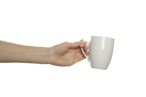 White cup in the female hand — Stock Photo, Image