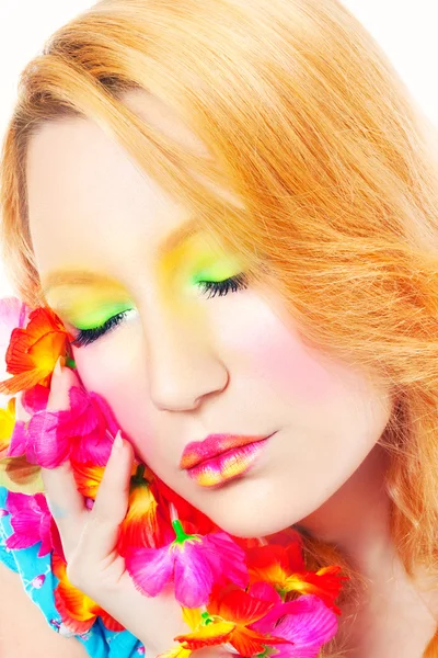 Studio shot of a blonde with colorful makeup — Stock Photo, Image