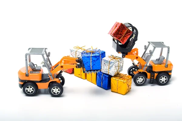 Modell leksak lastbilar skiftade gåvor Royaltyfria Stockfoton