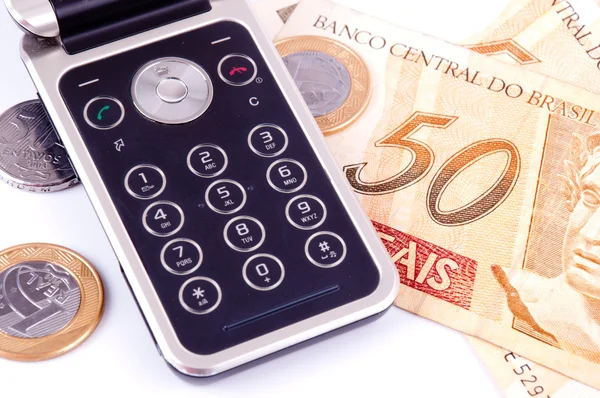 Mobile phone and money from Brazil — Stock Photo, Image