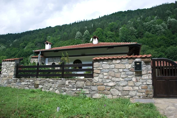 Hus i bjerget - Stock-foto