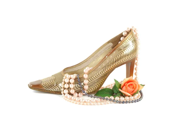 Frau goldener Schuh — Stockfoto