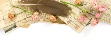 Background with old postcards (1890-1910) and flowers on white clipart