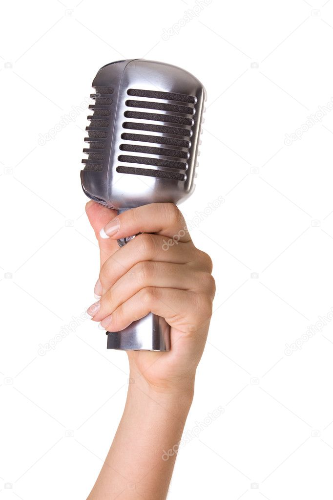 Retro styled microphone in hand isolated