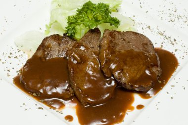 Veal steak with sauce demiglas clipart