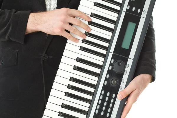 Muziek synthesizer in mannenhand — Stockfoto