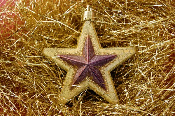 Estrella de Navidad fondo dorado —  Fotos de Stock
