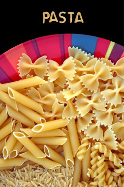 Dish with four kinds of pasta clipart