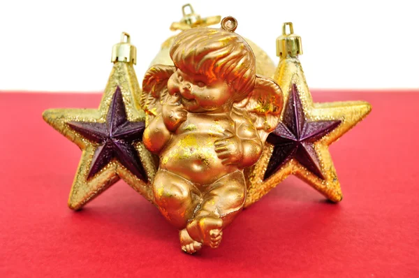 Engel und goldene Weihnachtssterne — Stockfoto