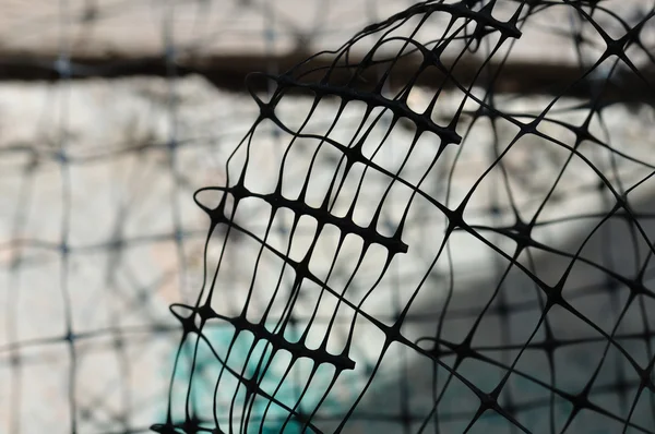 Plastic wire fence background — Stock Photo, Image