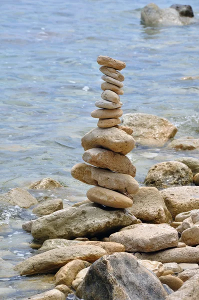 stock image Stone structure on rocky shore