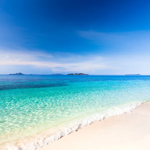 Tropická pláž malcapuya — Stock fotografie