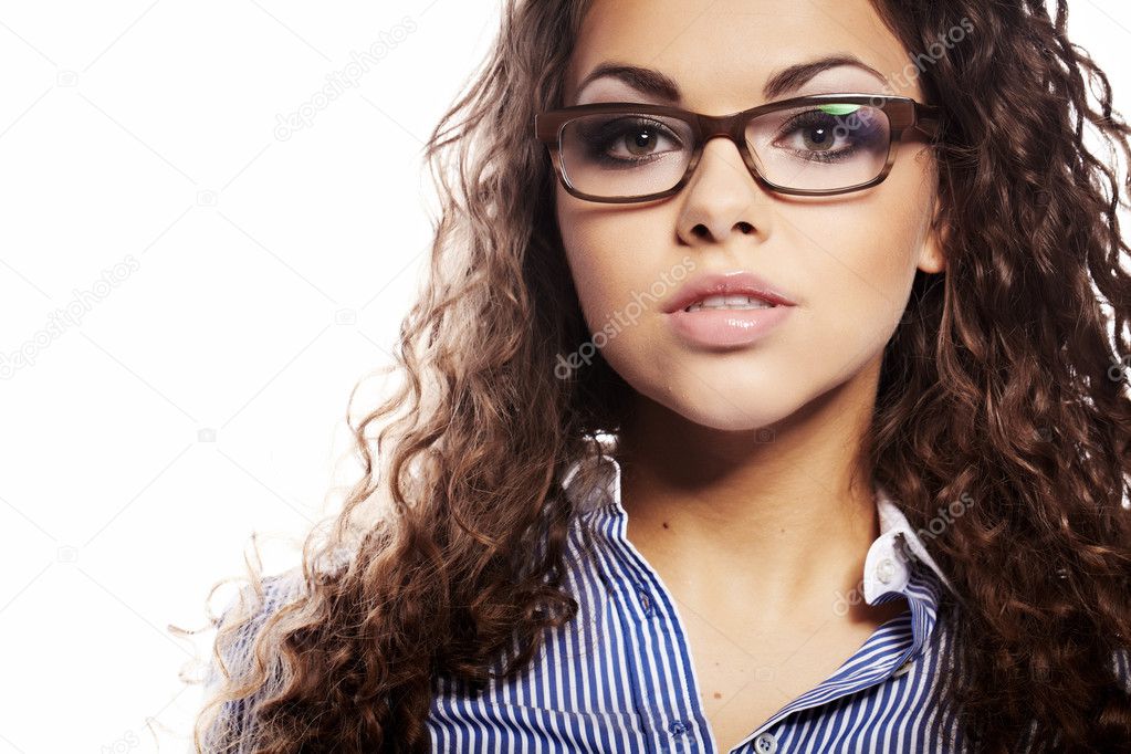 Portrait of a successful businesswoman in glasses a white backg