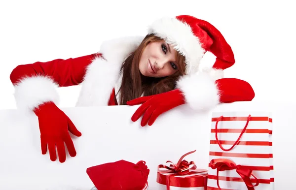 Sexy navidad chica sonríe y celebración de un regalo en el embalaje —  Fotos de Stock