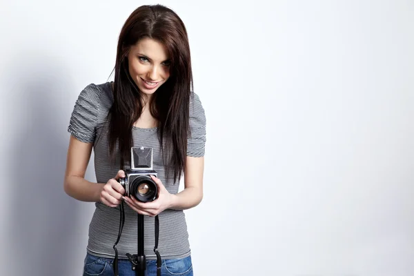 Vrouw met camera — Stockfoto