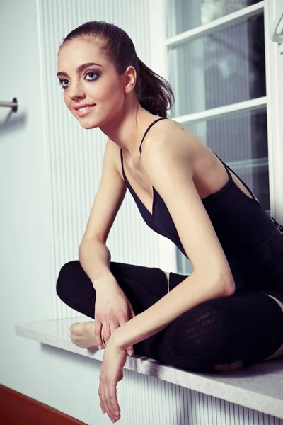 Beautiful ballet dancer relaxing after exercise — Stock Photo, Image
