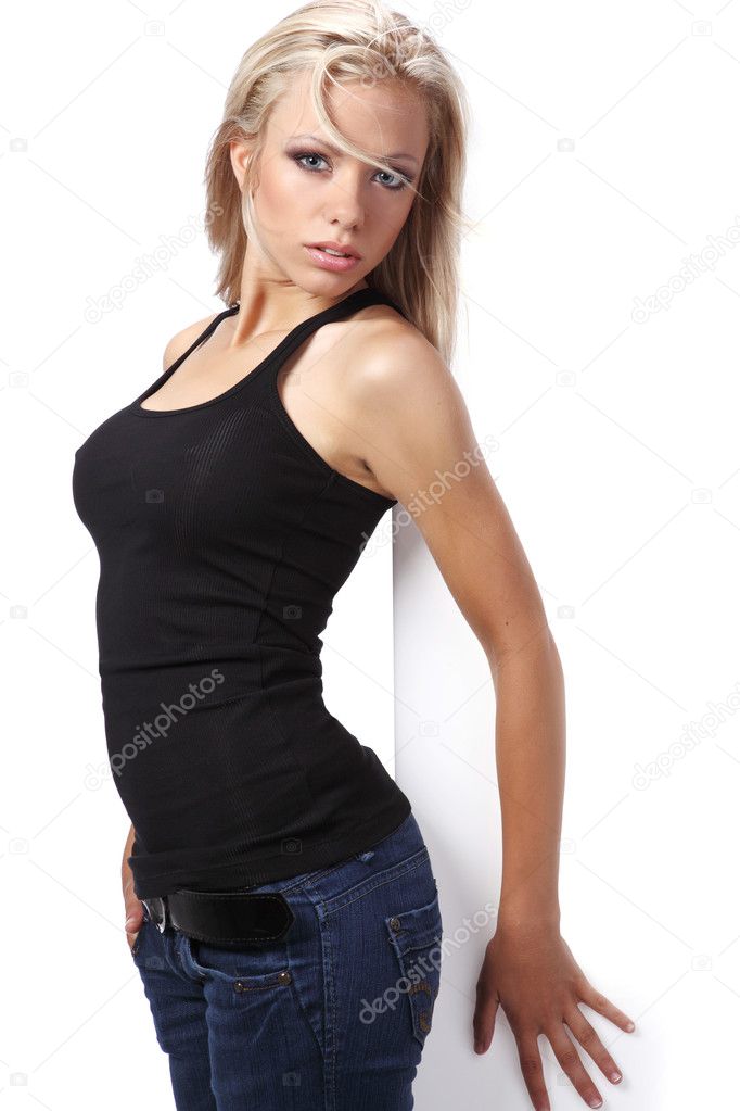 Sexy girl holding a billboard add isolated over a white backgrou
