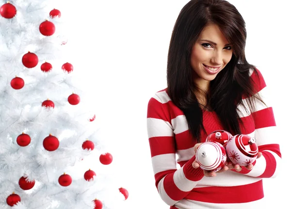 Young Woman decorating white christmas tree — Stock Photo, Image