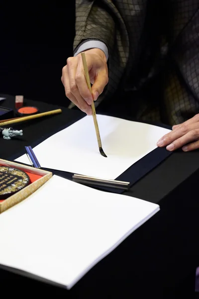 Pintura china y caligrafía sobre papel blanco —  Fotos de Stock