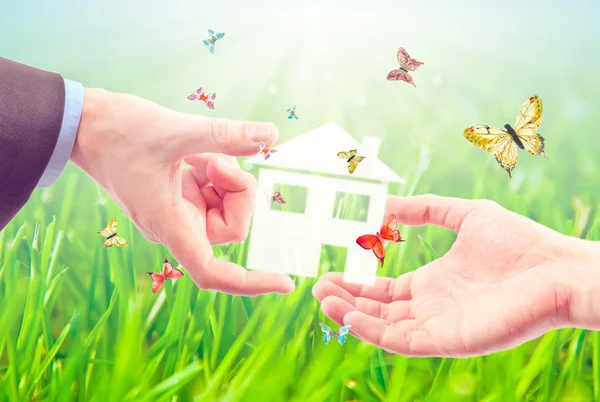 The House in the hands. Stock Photo