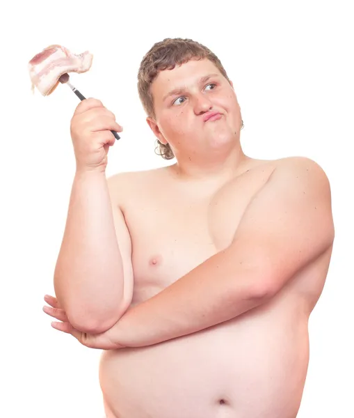 뚱뚱한 남자 그의 포크에 있는 큰 스테이크. — 스톡 사진