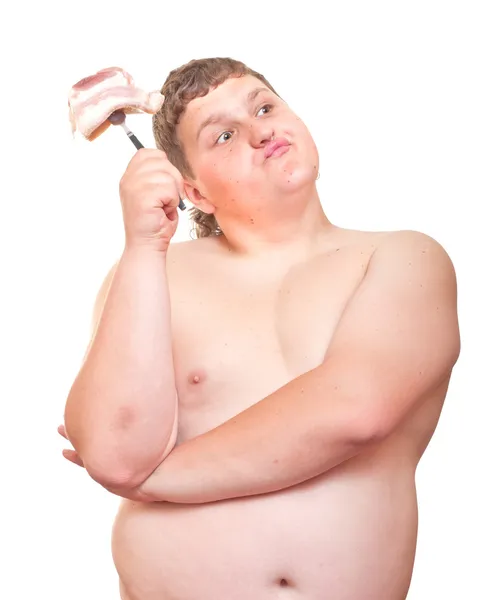 뚱뚱한 남자 그의 포크에 있는 큰 스테이크. — 스톡 사진