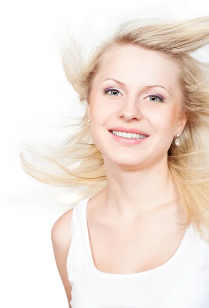 Schöne Blondine mit fliegendem Haar — Stockfoto