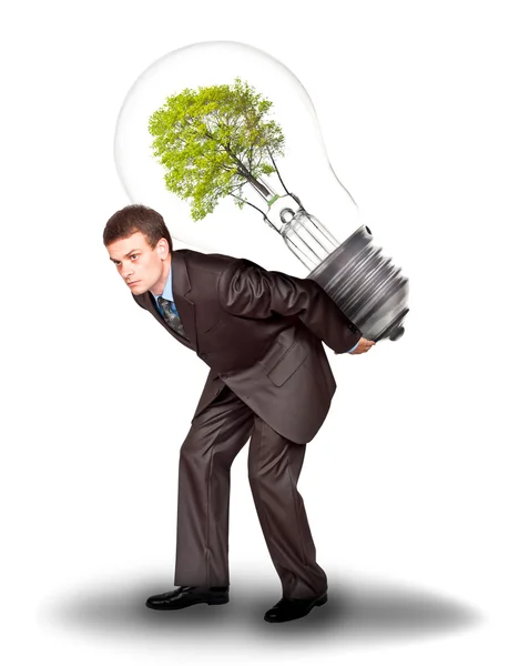 Businessman with eco lamp on back — Stock Photo, Image