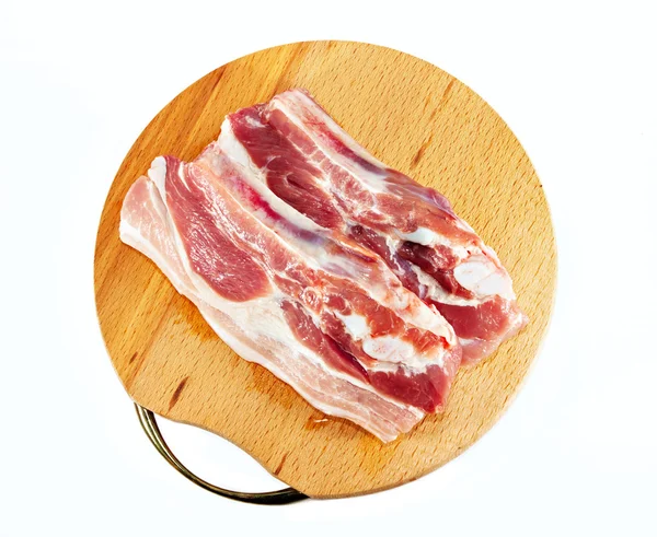 Červené syrové maso přes bílý — Stock fotografie
