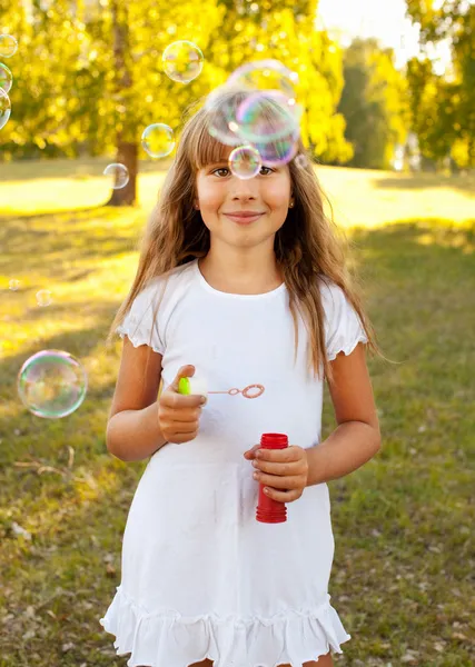 Girl with bubbles — Stock Photo, Image