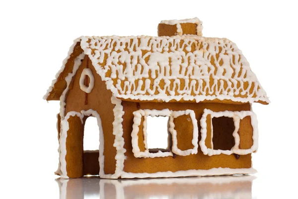 Gingerbread house on white Royalty Free Stock Images