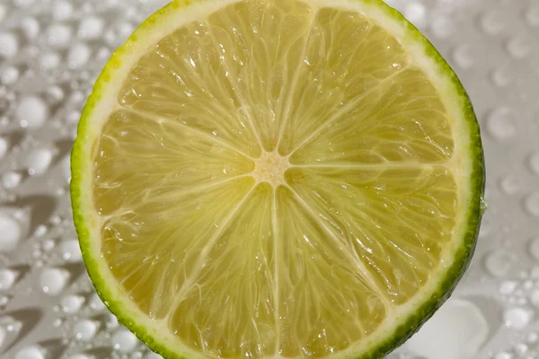 stock image Lime with water drops