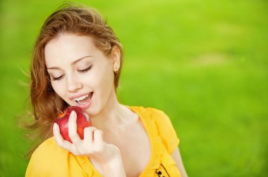 Beautiful girl with red apple clipart