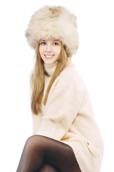 Woman in fur cap and sweater — Stock Photo, Image