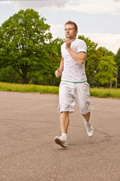 Portrait of sportsman runs — Stock Photo, Image