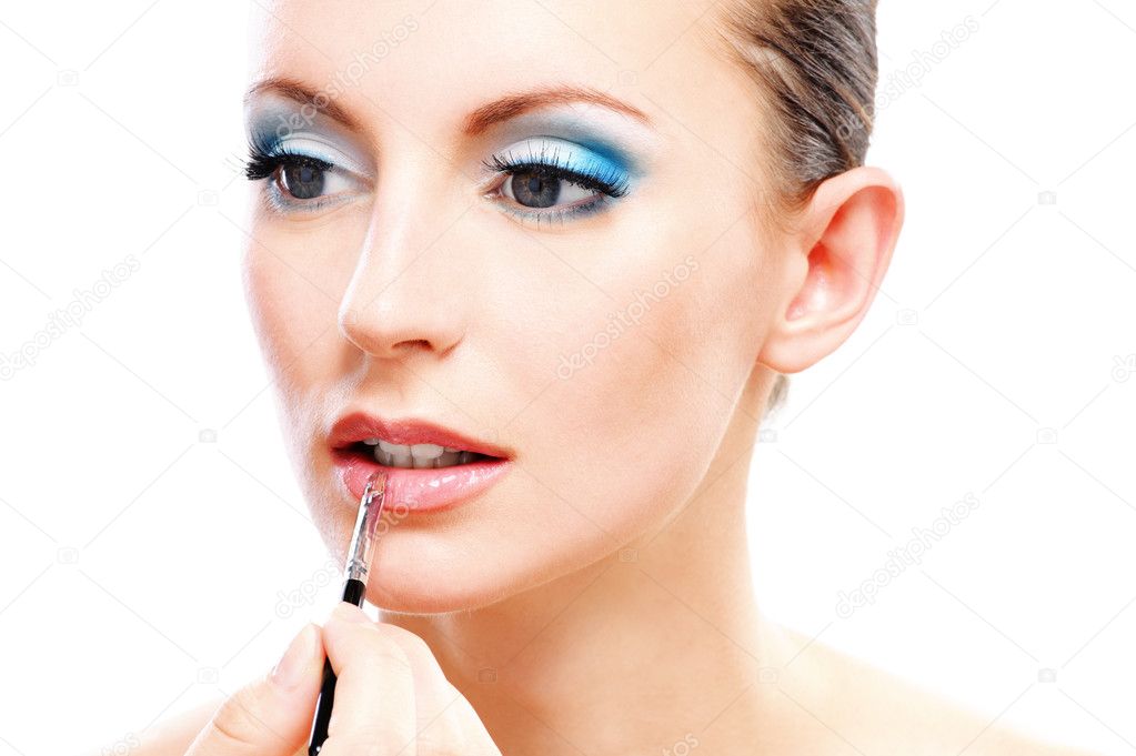 Woman close up with which paint lips