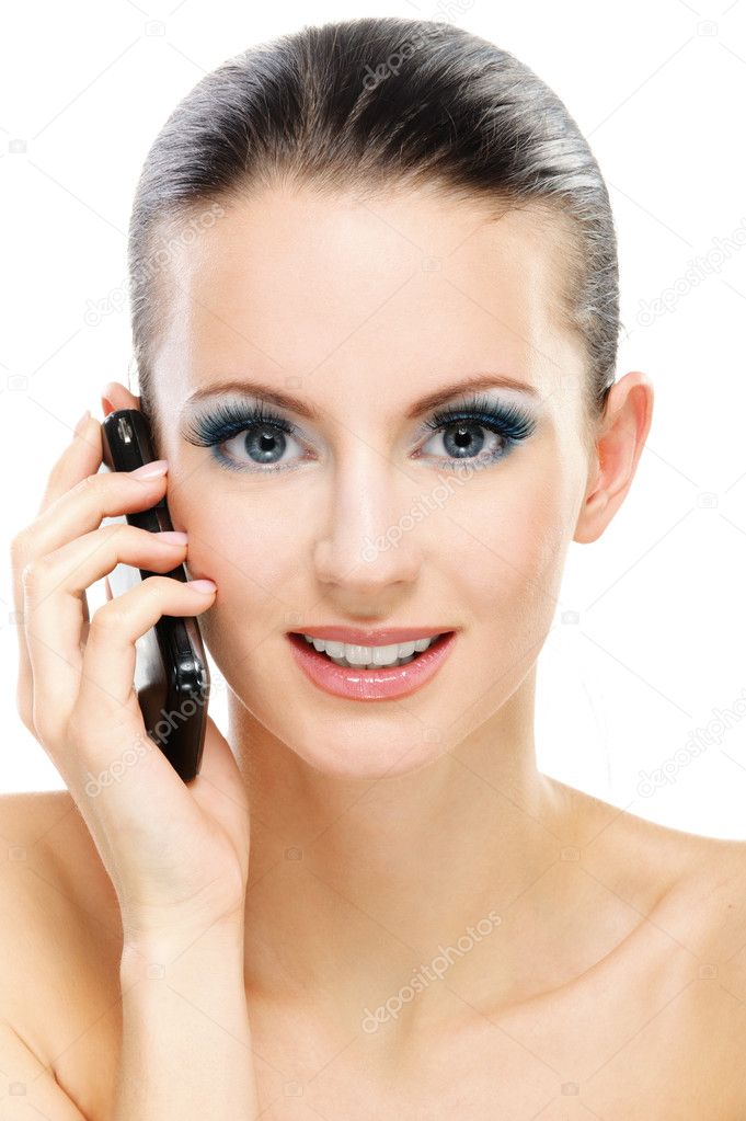 Woman talks by mobile phone