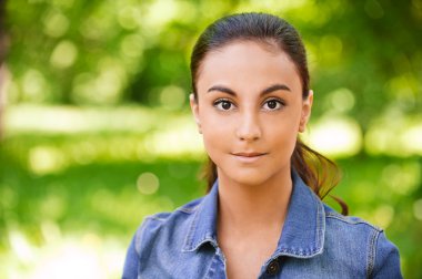 Portrait of beautiful young long-haired woman clipart