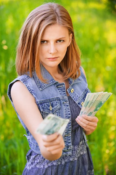 Portrait of strict woman with money — Stock Photo, Image