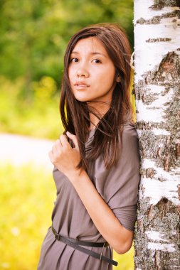 Portrait of young dreamy woman clipart