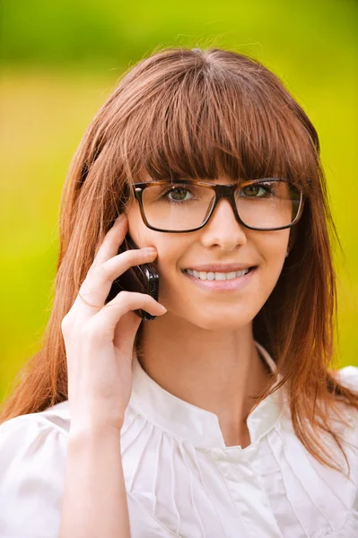 Portrait of young lady with phone — Stock Photo, Image