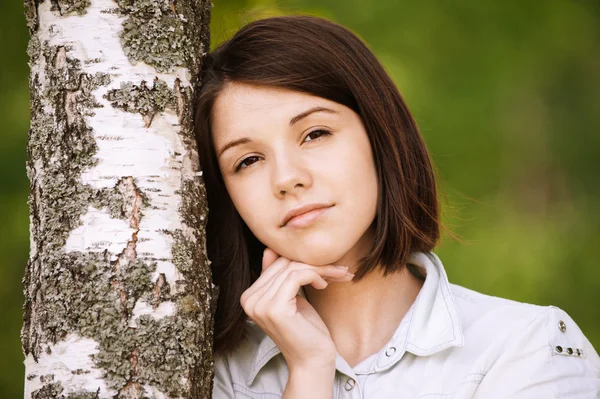 Portrait of young pensive woman — Stock Photo, Image