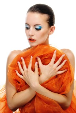 Portrait of young woman holding cloth in front of her body clipart