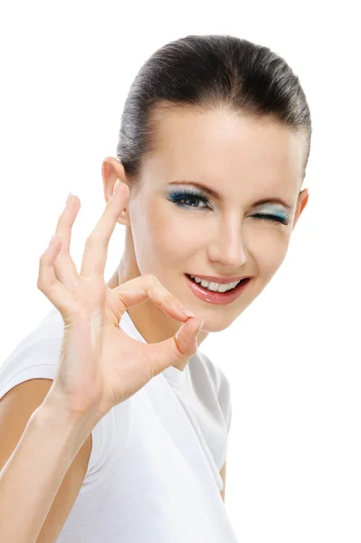 Portrait of young beautiful woman showing "ok" sign — Stock Photo, Image