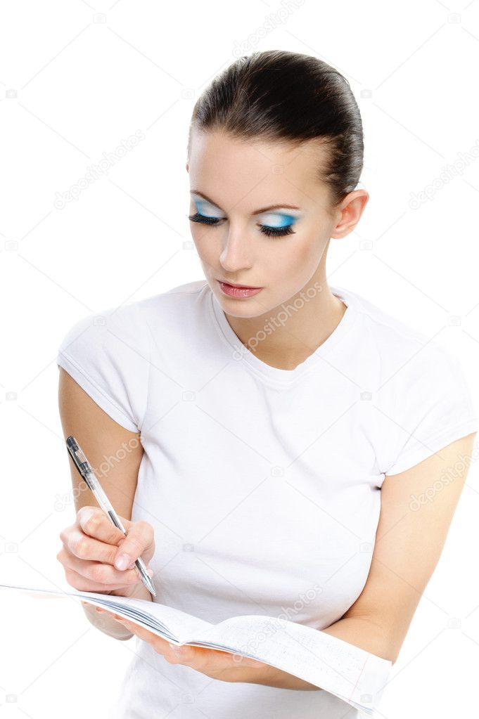 Portrait of woman writing something