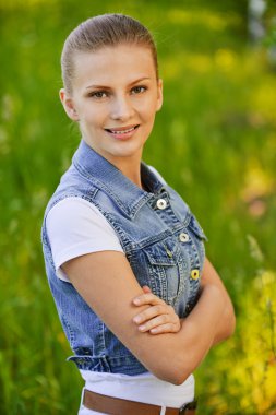 Portrait of young smiling woman clipart