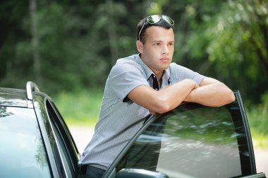 Portrait of young pensive man clipart