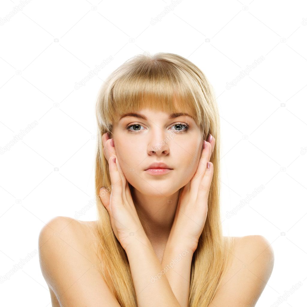 Portrait of young blonde against white background