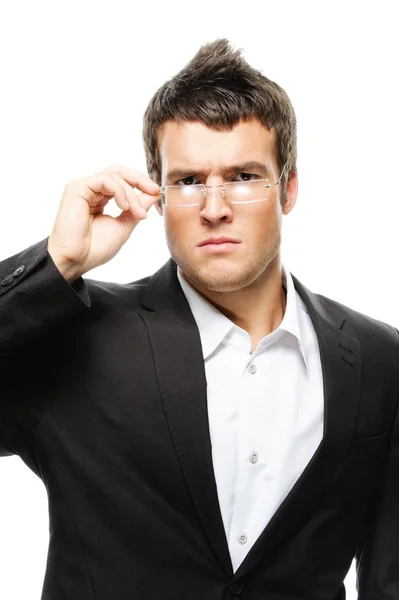 Portrait of young man wearing suit and eyeglasses — Stock Photo, Image