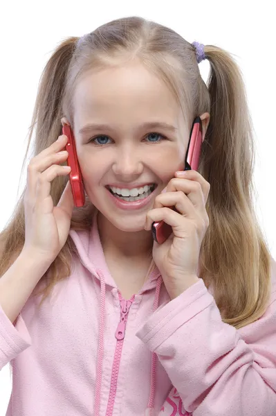 2 つの電話を持つ少女の肖像画 — ストック写真